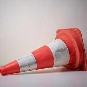 A tipped-over traffic cone.