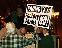 farms yes cafos no sign.jpg