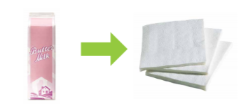 Green arrow pointing from a gable-top milk carton to a stack of papers
