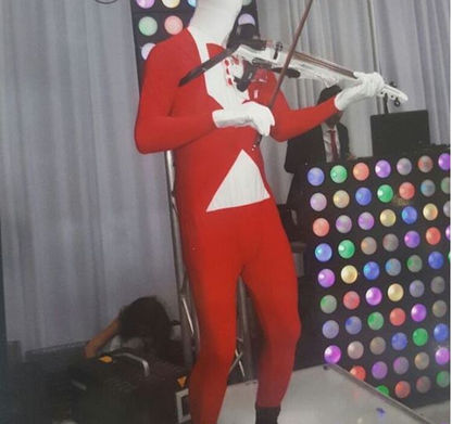 Image of theme based DJ violinist
