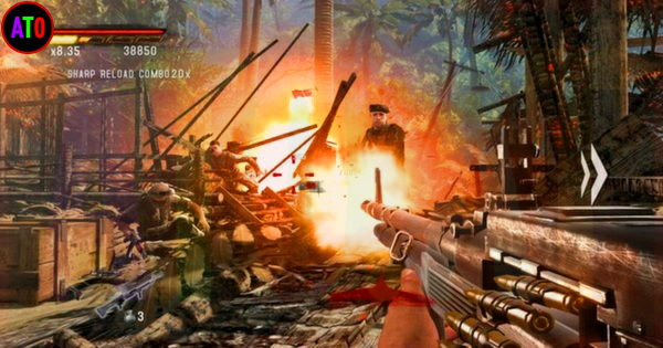 لعبة فيديو: لاعب يطلق النار على جنود أمام انفجار في غابة. نصوص: "SHARP RELOAD COMBO 2DX". الأجواء مثيرة وعنيفة.