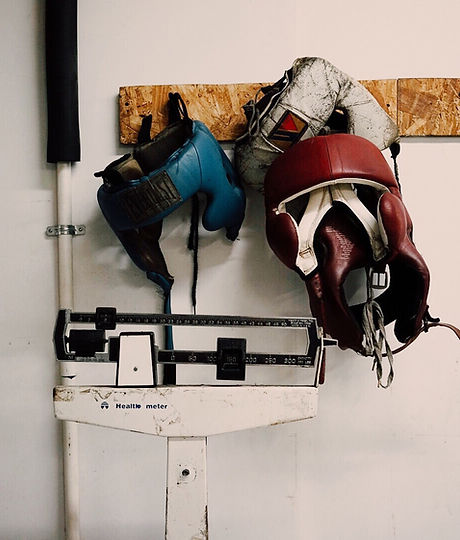 Boxing Head Protectors Mounted On Wall