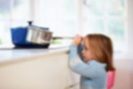kid pulling pan scaled.jpeg