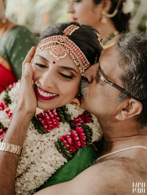 Emotional close-up of teary-eyed grandmother during wedding – heartfelt candid wedding moment.
