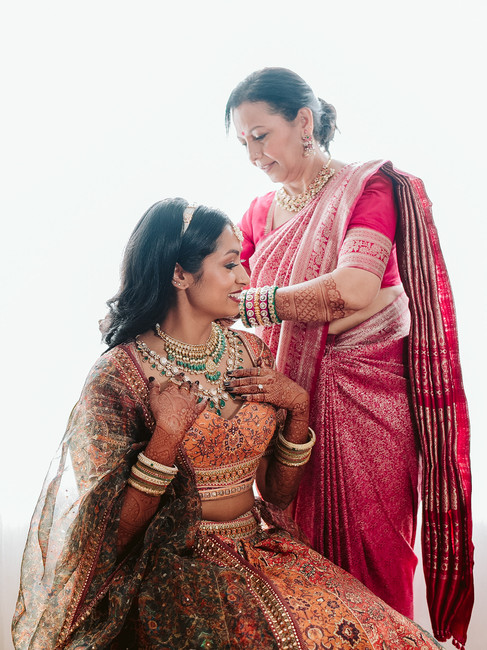 Behind-the-scenes bridal makeup and prep moment before the wedding – 2025 candid photography trend.