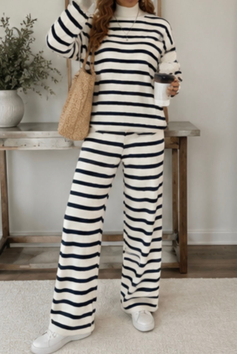 The Rowan Knit Two-Piece Set featuring black and white stripes, a long sleeve knit top, and matching wide-leg pants.