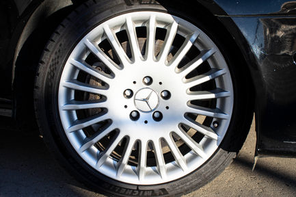 a mercedes wheel with a michelin tire on it