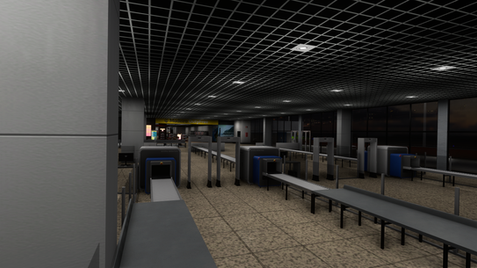Airport security checkpoint featuring accurate scanning equipment and terminal interior lighting.