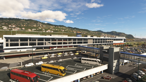 Landside view of the Madeira Airport terminal with ground transportation hubs, parking, and access roads.
