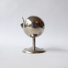 Vintage space-age ashtray. 1960s/1970s chromed steel ball on one leg. Retro mid-century modernist flip open. Metal round orb, Mad Men style