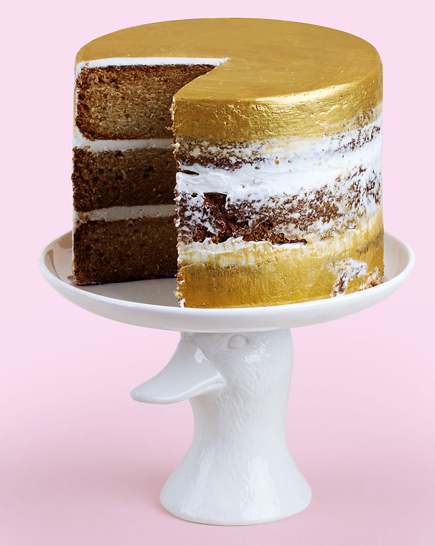 Gold and White Cake on a Stand