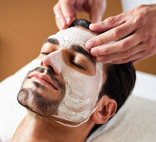 man receiving a facial at a spa.jpg