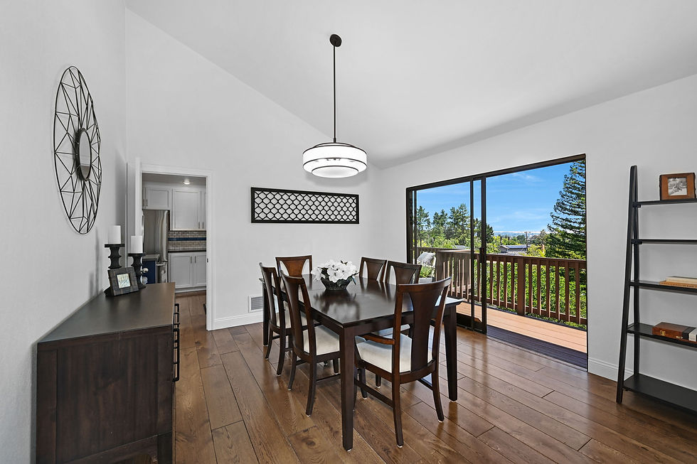 Hardwood floors enhance the warm feel of a large Dining Area overlooking the rolling hills of the Diablo Valley