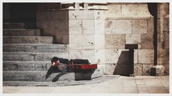 The busker at rest