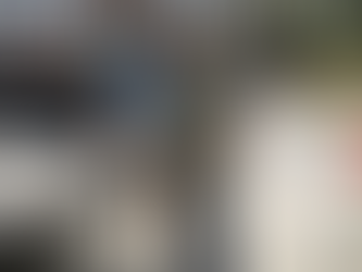 Homeowner and contractor reviewing decorative concrete samples