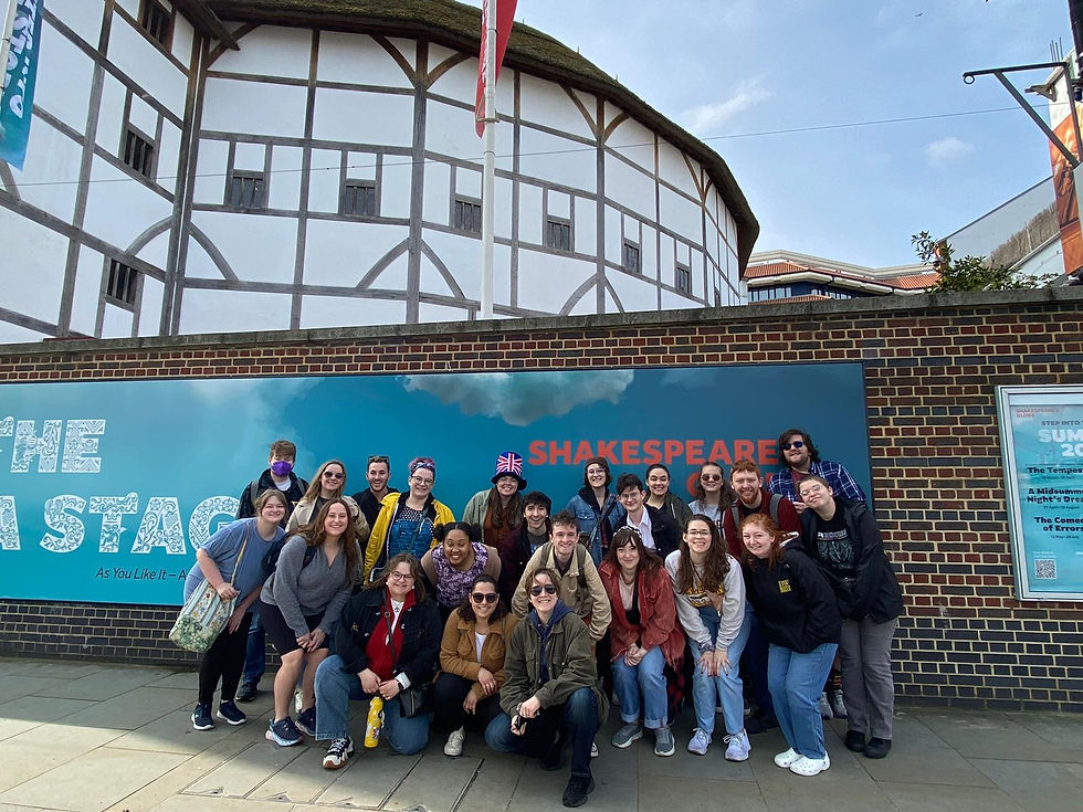 A group of students from Baldwin Wallace pose in front of the Globe Theater in London