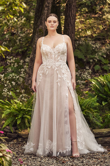 Elegant Off-Shoulder Bridal Gown With A Dramatic Train.