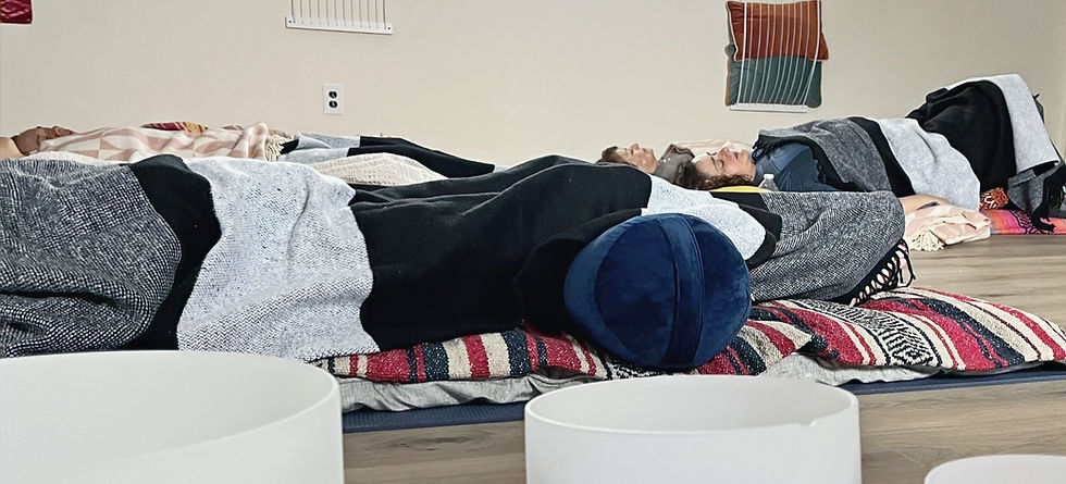 People are relaxing during the Sound Bath Healing session at Malina Portals in Island Park, NY.