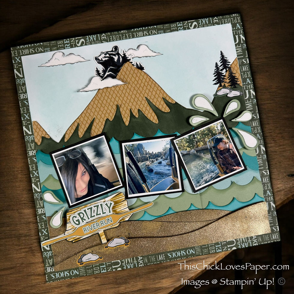 Scrapbook page with mountain and water theme. Features three small photos, labeled "Grizzly River Run." Background has text and patterns.
