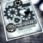 Steampunk-themed card with gears, a heart, and text "YOU+ME=SPARKS" on a weathered background. Mood is industrial and romantic.