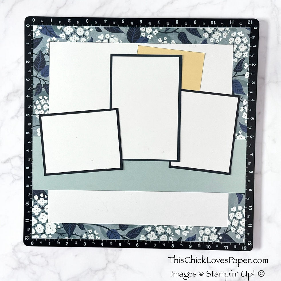 Scrapbook layout with white and pastel papers on a floral background, black ruler border. Website and copyright text visible.