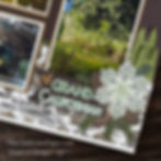 Scrapbook page with three photos, trees, and decorated with pinecones and a snowflake. Text reads "Grand Californian." Mood is festive.