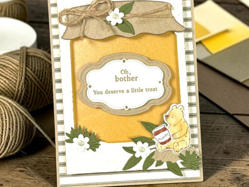 Learn how to make a 5x7 Winnie the Pooh-inspired Honey Jar Card featuring Stampin’ Up! Silly Old Bear DSP, Filled With Sweetness Bundle, golden shimmer, layered die cuts & dimensional paper crafting techniques.