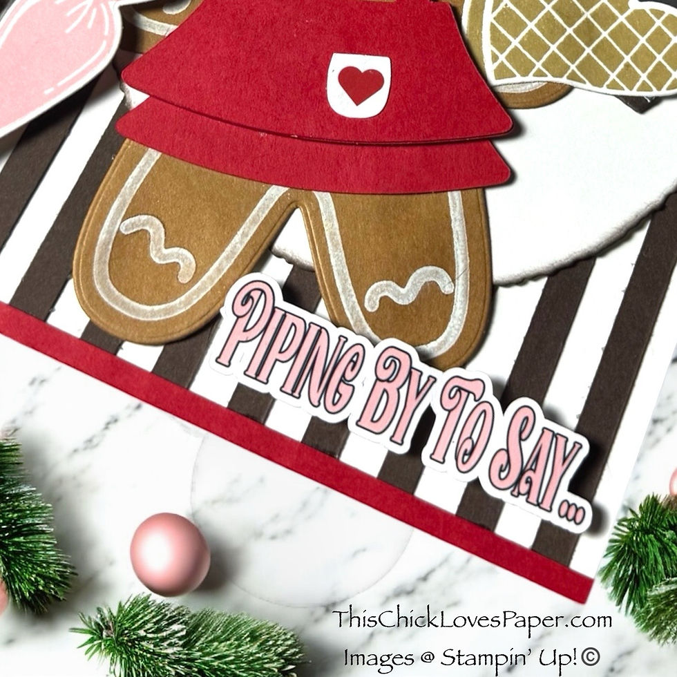 Gingerbread figure with red apron on striped background, text "Piping by to say...". Greenery and pink ornaments nearby.
