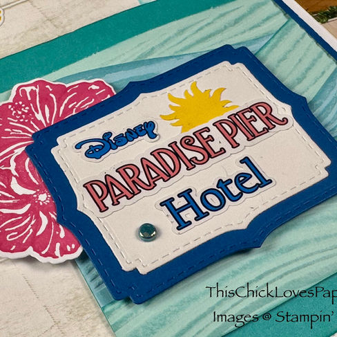 Custom-designed Paradise Pier Hotel title—bringing a touch of Disney magic to this scrapbook layout!