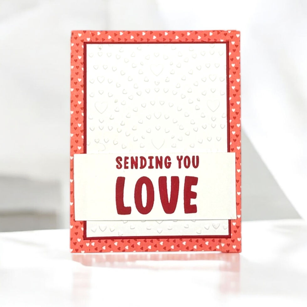 Red and white greeting card with textured hearts, featuring "Sending You Love" text. Red heart-patterned border creates a warm feel.