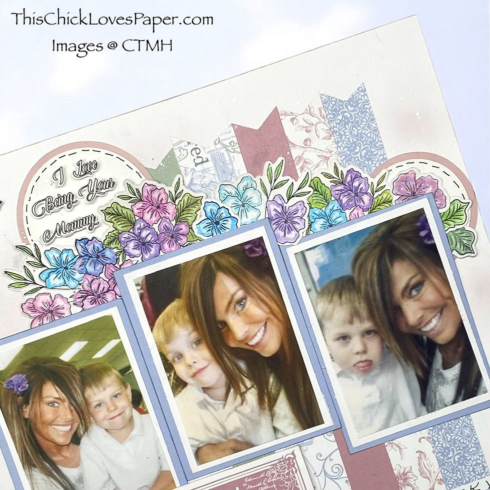 Scrapbook page with two photos of a woman and child smiling. Floral decorations, text "I Love Being Your Mommy," pastel tones.