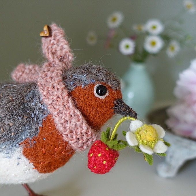 Thumbnail: Sage robin with wild strawberry