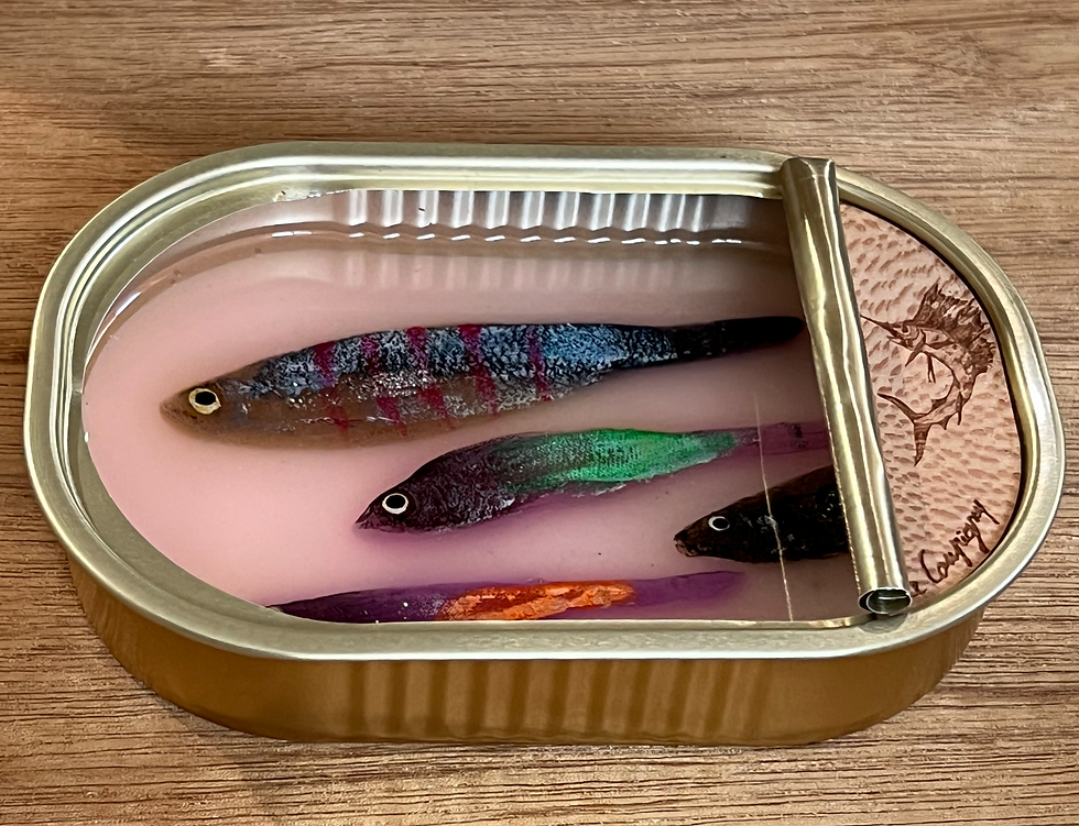 Sardine can sculpture with wax-modeled fish and wooden swordfish engraving by Ortaire de Coupigny, titled Tropical Waters.