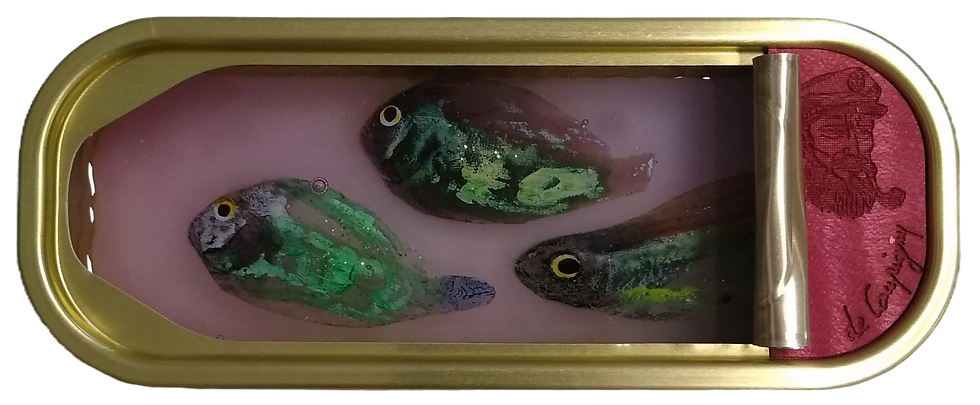 Three sculpted fishes and one engraved fisherman's head by Ortaire de Coupigny