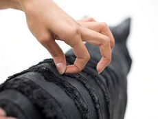 Haruka Miyamoto's hand as she is working on one of her sculpture.
