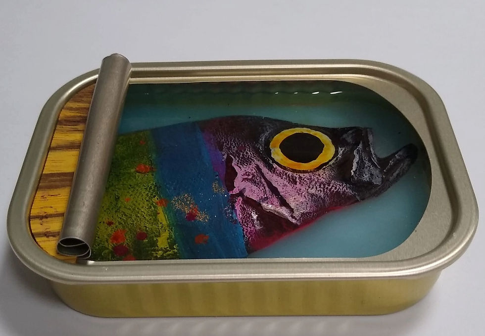 Expressionist contemporary artwork by Ortaire de Coupigny representing a colourful fish sculpted in a sardine can.