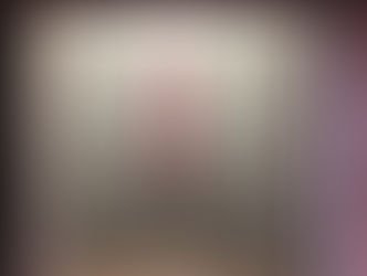 Traditional Japanese tokonoma alcove with contemporary vertical artwork and ceramic vessel at Art San Gallery