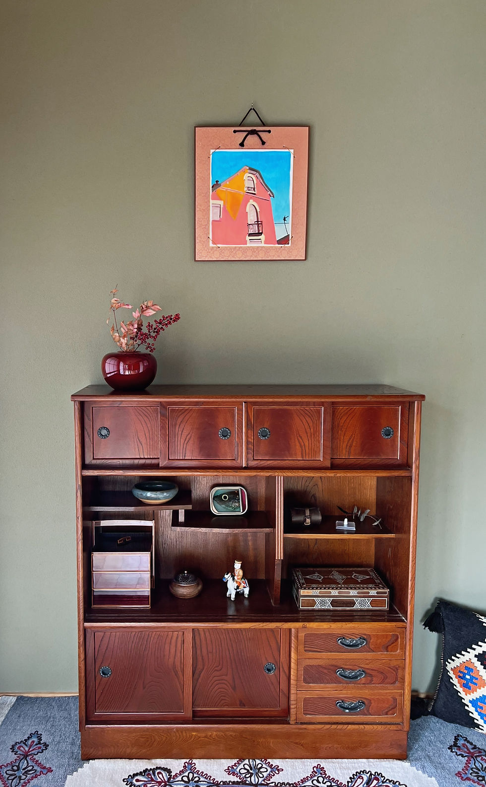 Sebastien Coueffic oil painting on a Japanese shikishi art board displayed in Art San Gallery setting above a wooden cabinet.