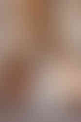 Bride and groom standing under tall moroccan arches at Beldi Country Club in Marrakesh on their wedding day