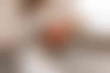 wedding bouquet by florist Sass flower with pink and peach roses, olive greenery and dried flowers