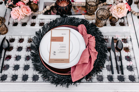 boho table setting with black and pink colour palette at Beldi Country Club