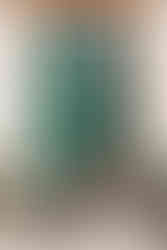 couple sitting on steps decorated with roses outside a church on the Amalfi coast