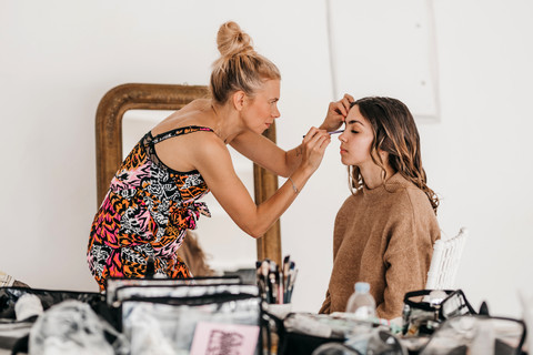 Meg getting her makeup done by makeup artist Amy George Makeup for her Amalfi coast elopement