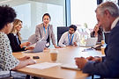 businesswoman-leading-multi-cultural-business-team-2026-01-05-22-55-28-utc.jpg
