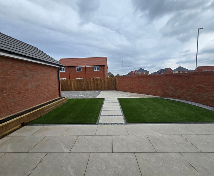 astro turf, artificial grass, landscaping, porcelain patio, patio, raised beds