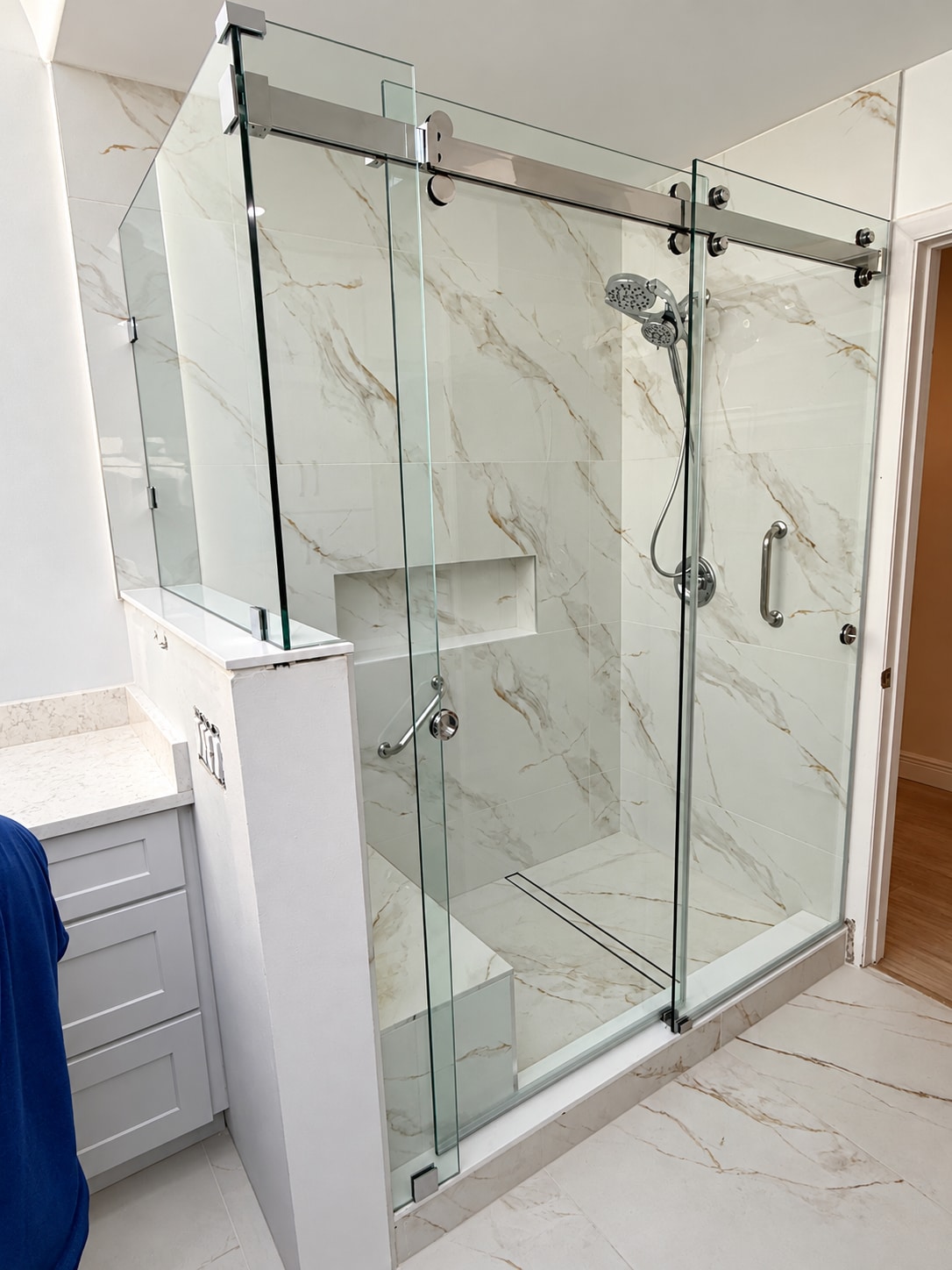 Marble shower & sliding glass