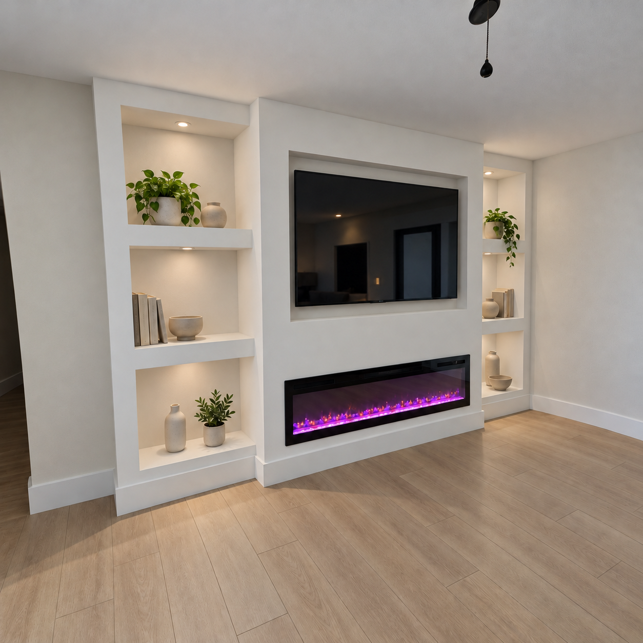 Built-in entertainment wall with a TV above the electric fireplace and lightly decorated illuminated cubbies