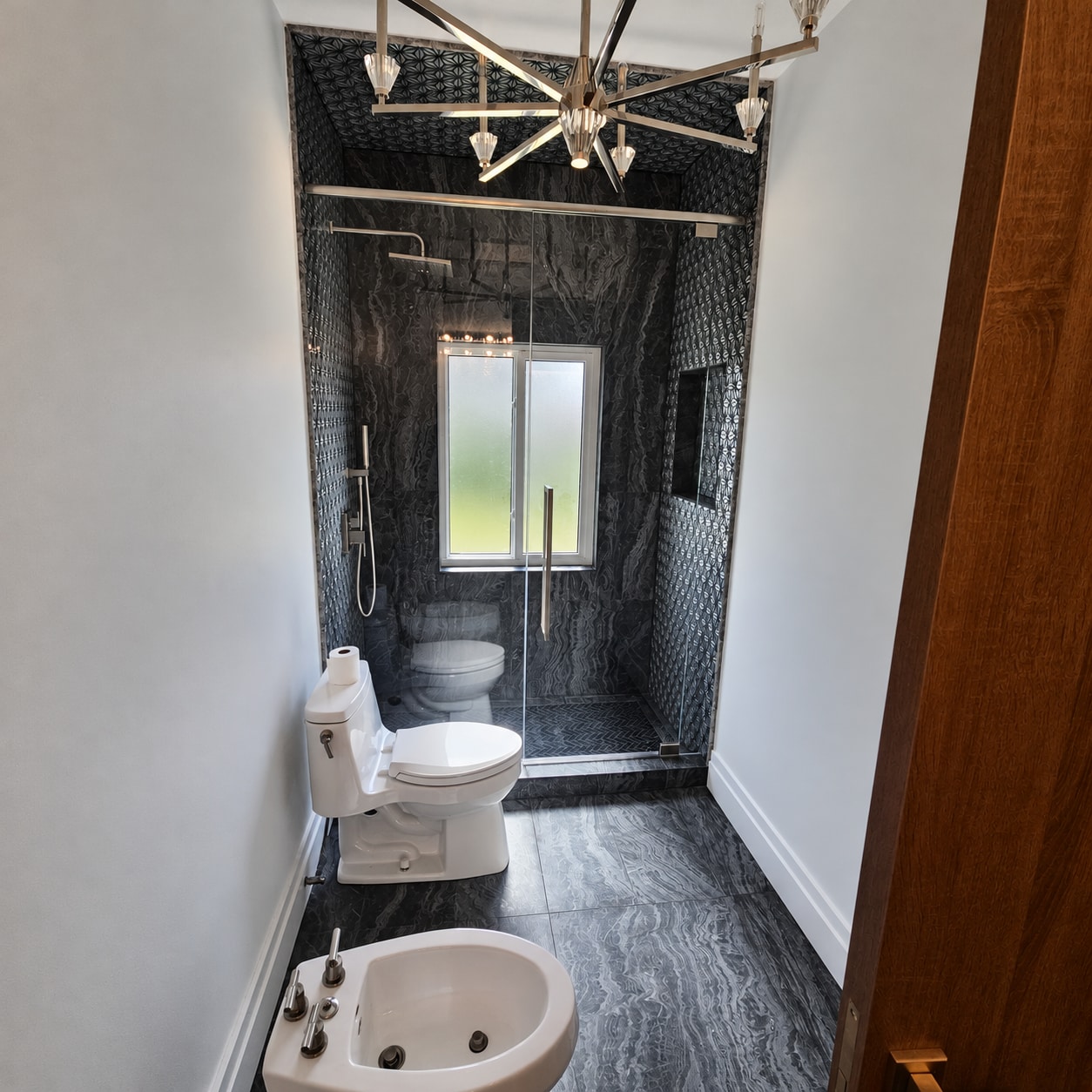 Dark marble bathroom suite