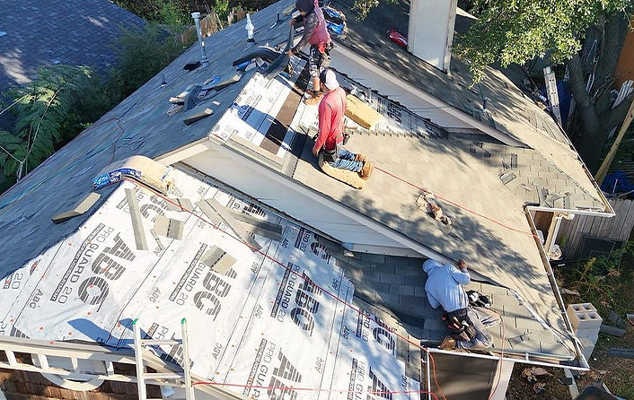 OLIs Home Restoration - Roofing Services.jpg