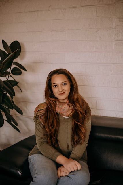 Shira Hearn, LMFT, seated in her office